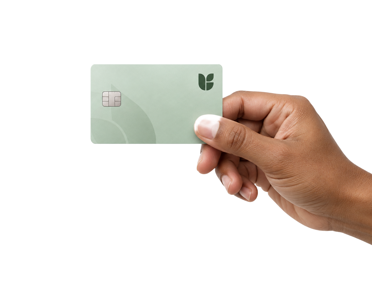 A hand holding a Banklio payment card